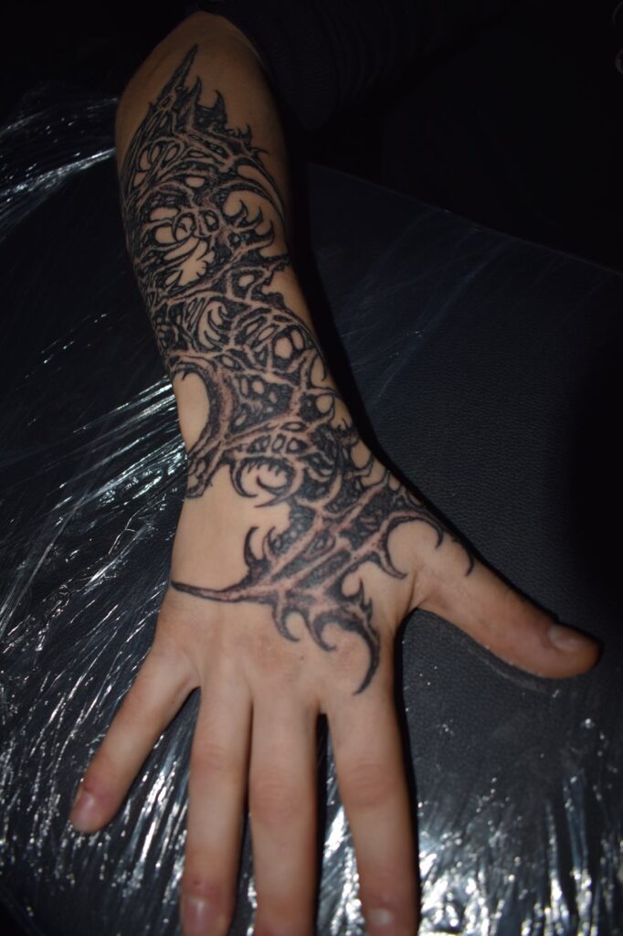 Freehand blackwork hand and forearm