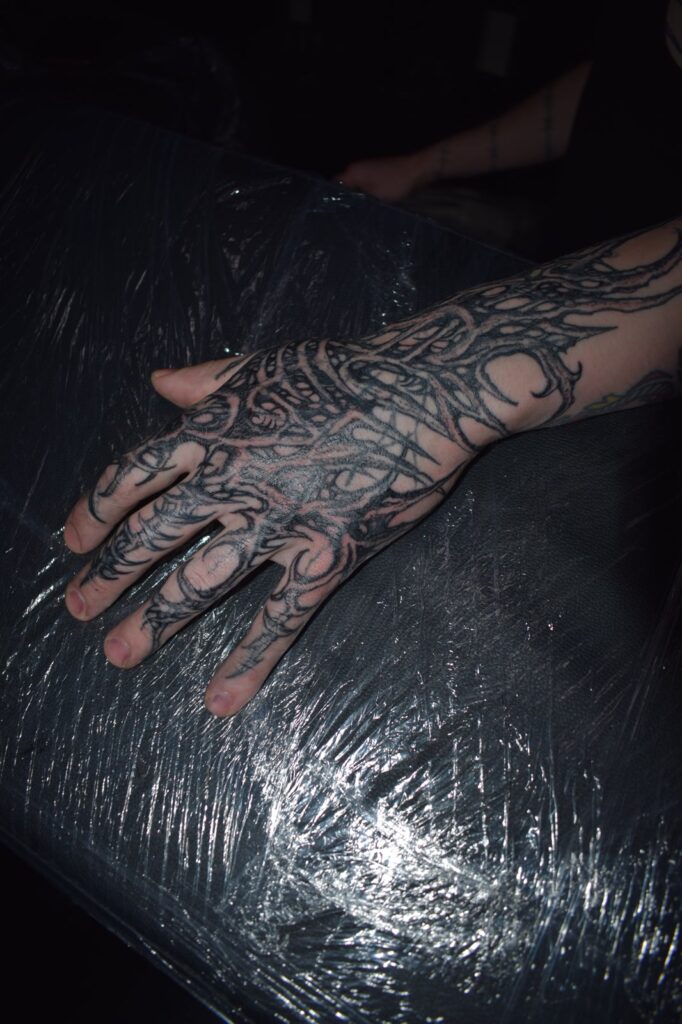 Freehand blackwork hand and fingers